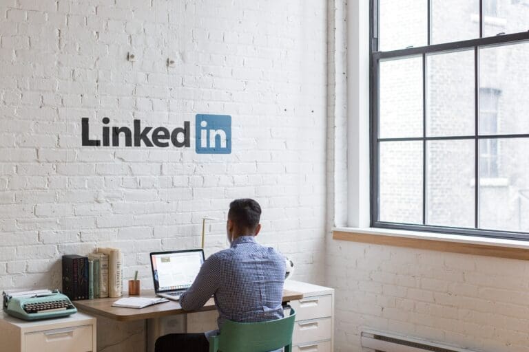 Linkedin Employee Sitting at Desk